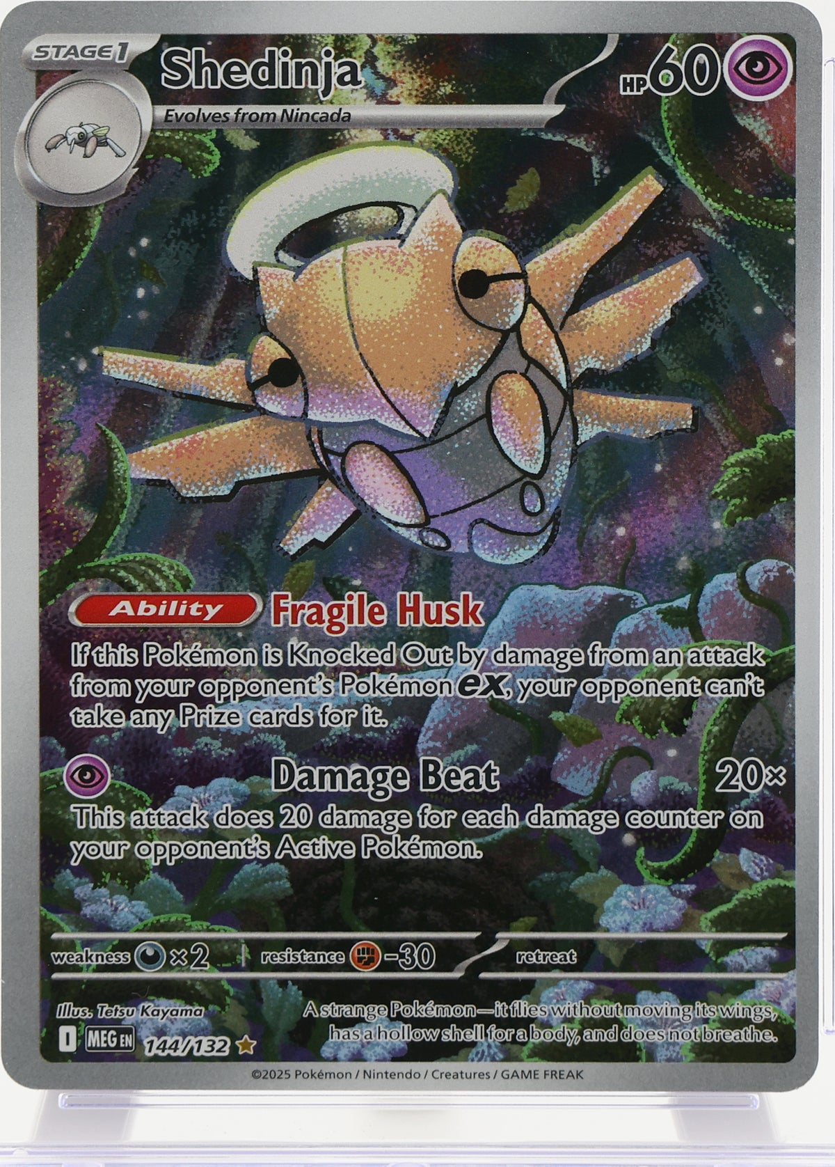 Shedinja · Mega Evolution · 144/132 · actual card-only photograph · illustrated holder display